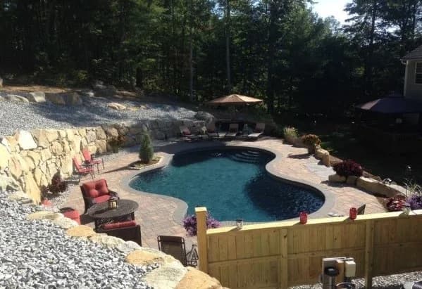 Inground pool with landscape lighting